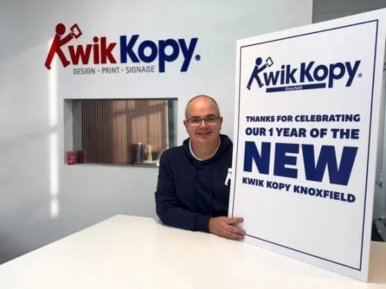 Scott Watkins, owner of Kwik Kopy Knoxfield, standing in his Melbourne print and signage centre